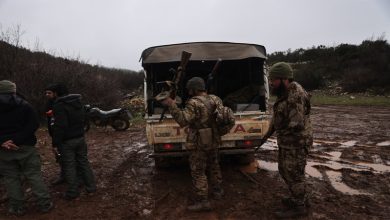 عناصر من الفصائل السورية المسلحة في ريف اللاذقية